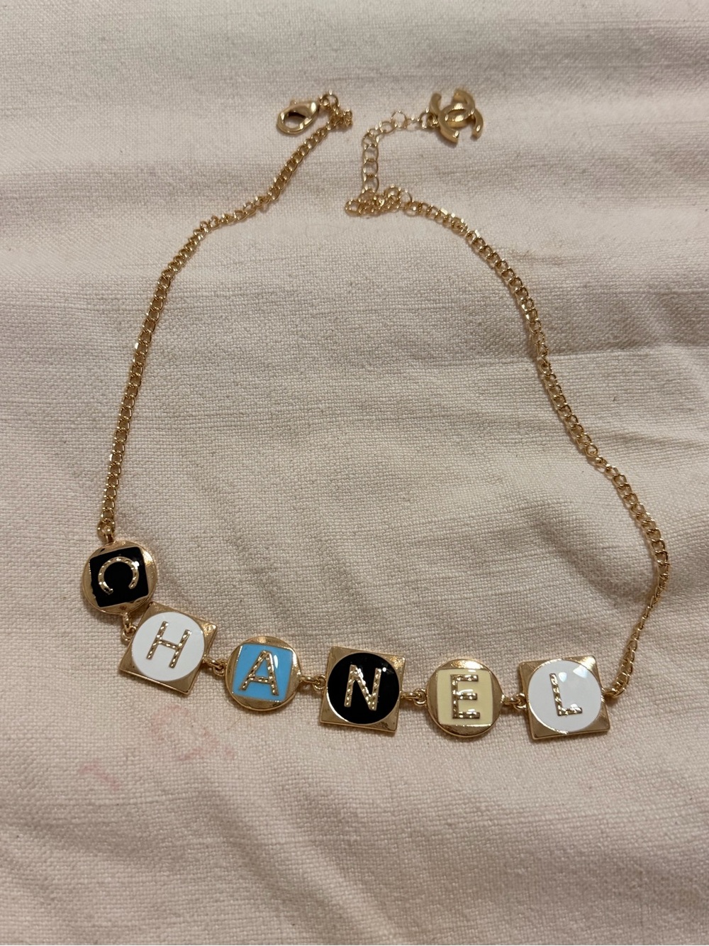 Chanel-Inspired Gold Tone Multicolor Logo Necklace - Gold, Black, White, Blue